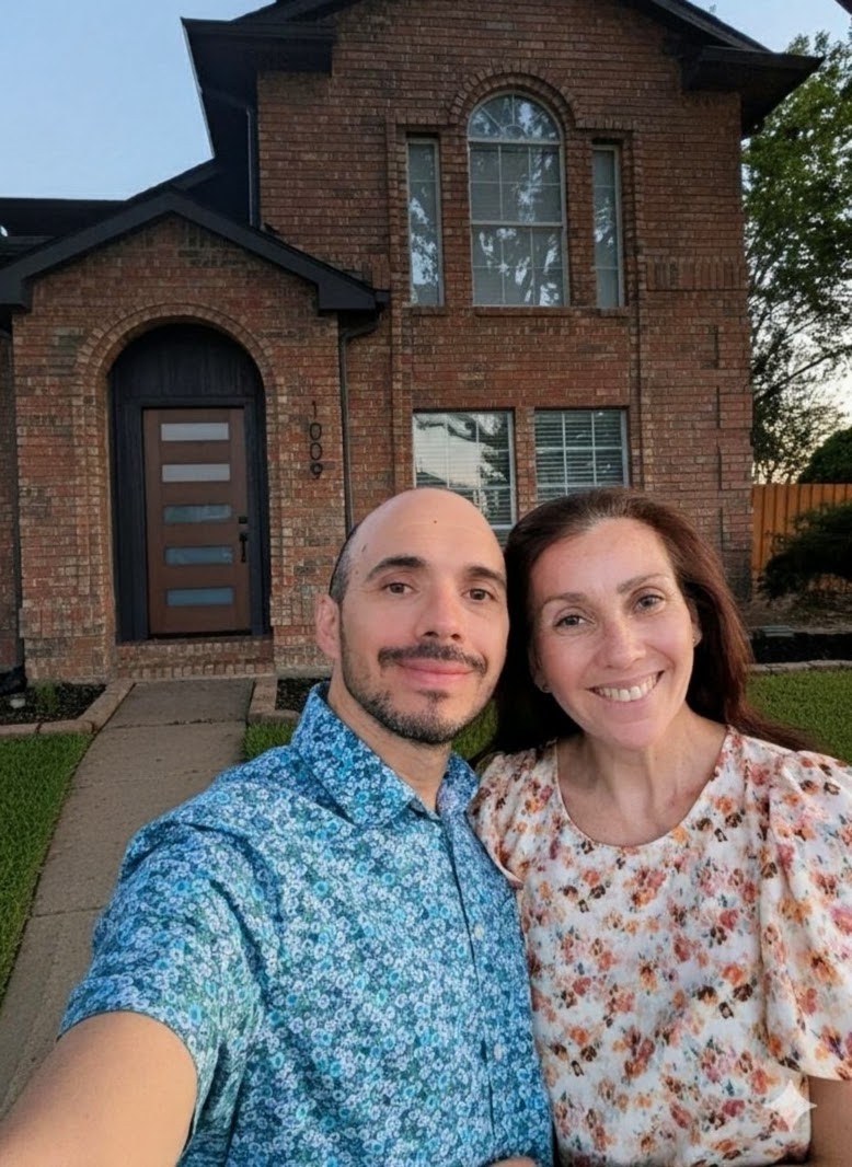 Diego and Blanca in front of a DFW home